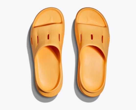 Hoka Ora Recovery Slide white, pink, green, lime, orange, and grey